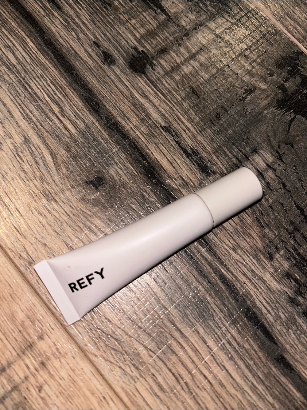 REFY tinted lip gloss in plum